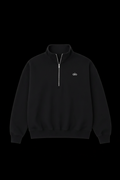 Alo black quarter-zip on black background