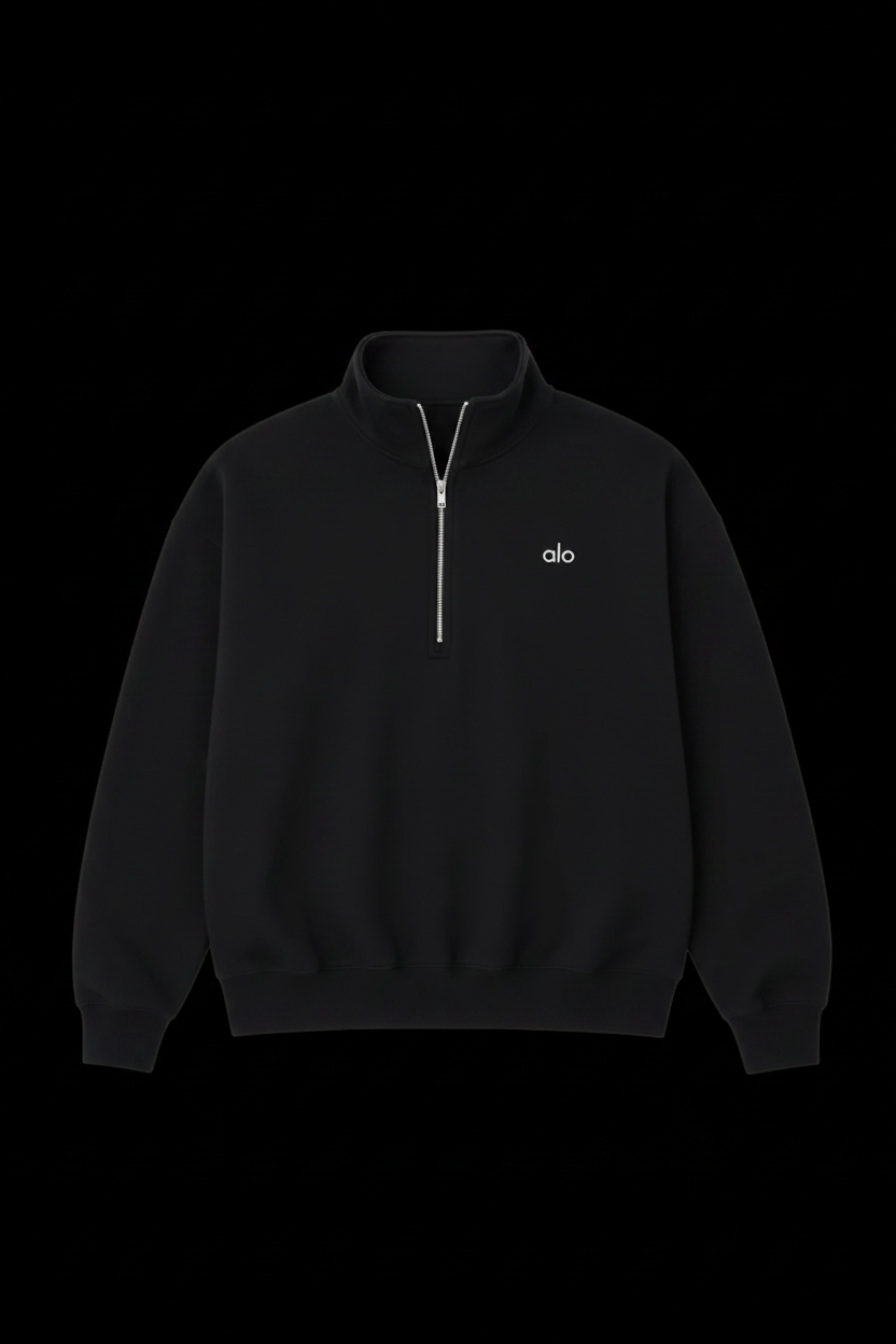 Alo black quarter-zip on black background