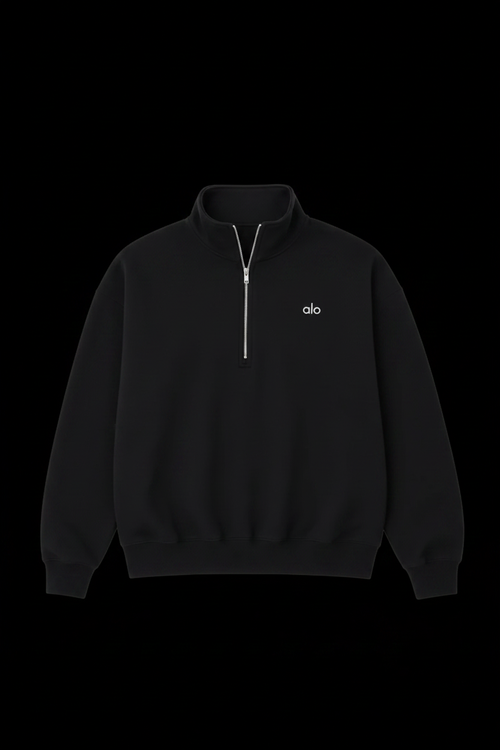 Alo black quarter-zip on black background